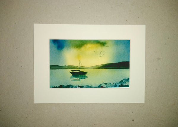 A boat in the sunset on the west coast.